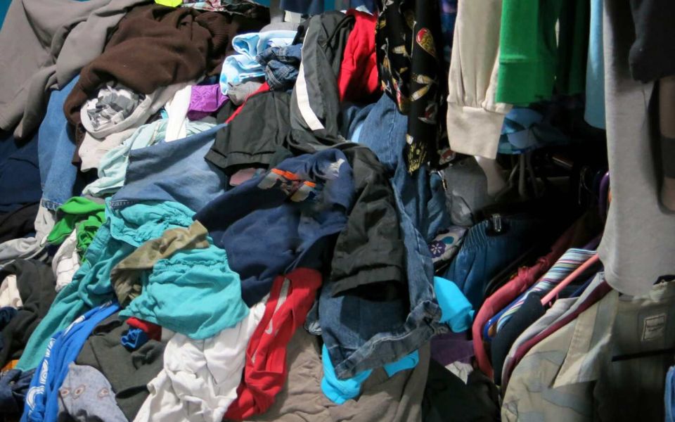 sad person in messy room